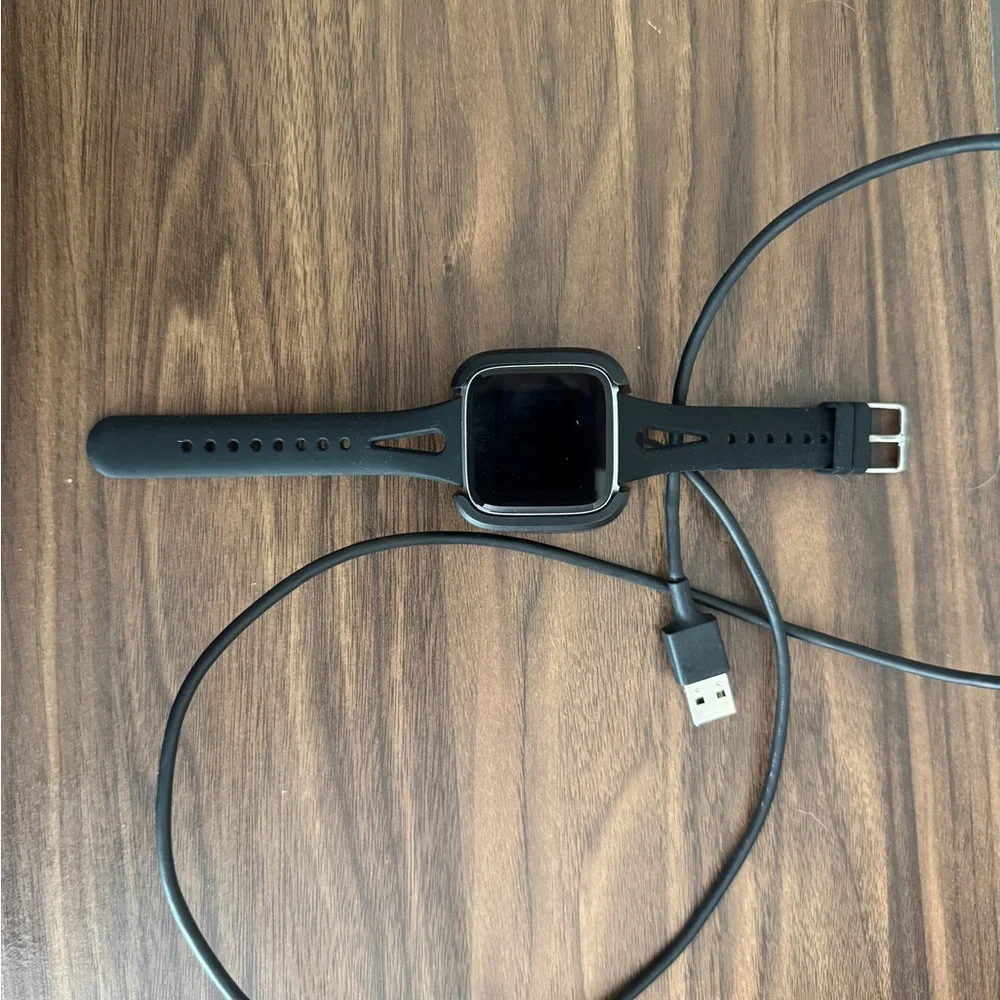 Fitbit Versa Black and Silver Smartwatch, Charger Included
